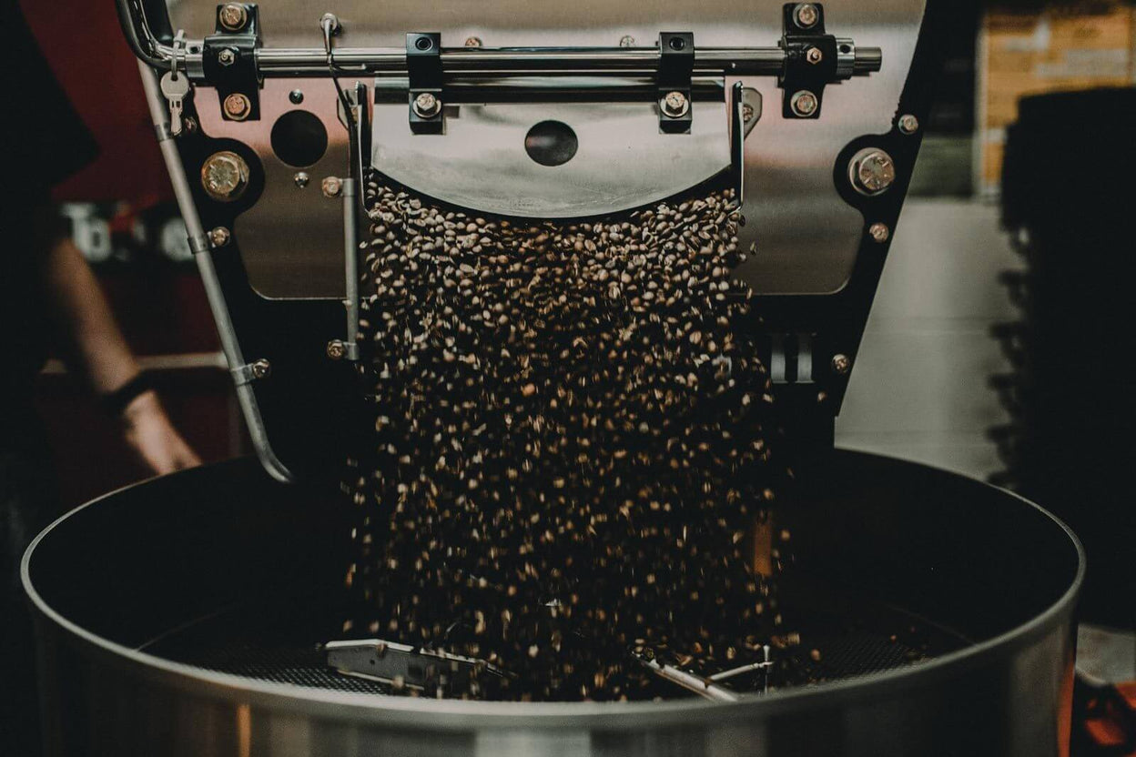 Coffee pouring into our roaster